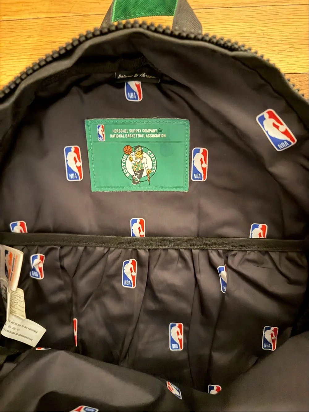 Herschel Supply Company Black Backpack with Green Celtics Lettering